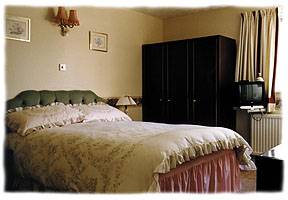 Bedroom at Fort Wayne Hotel